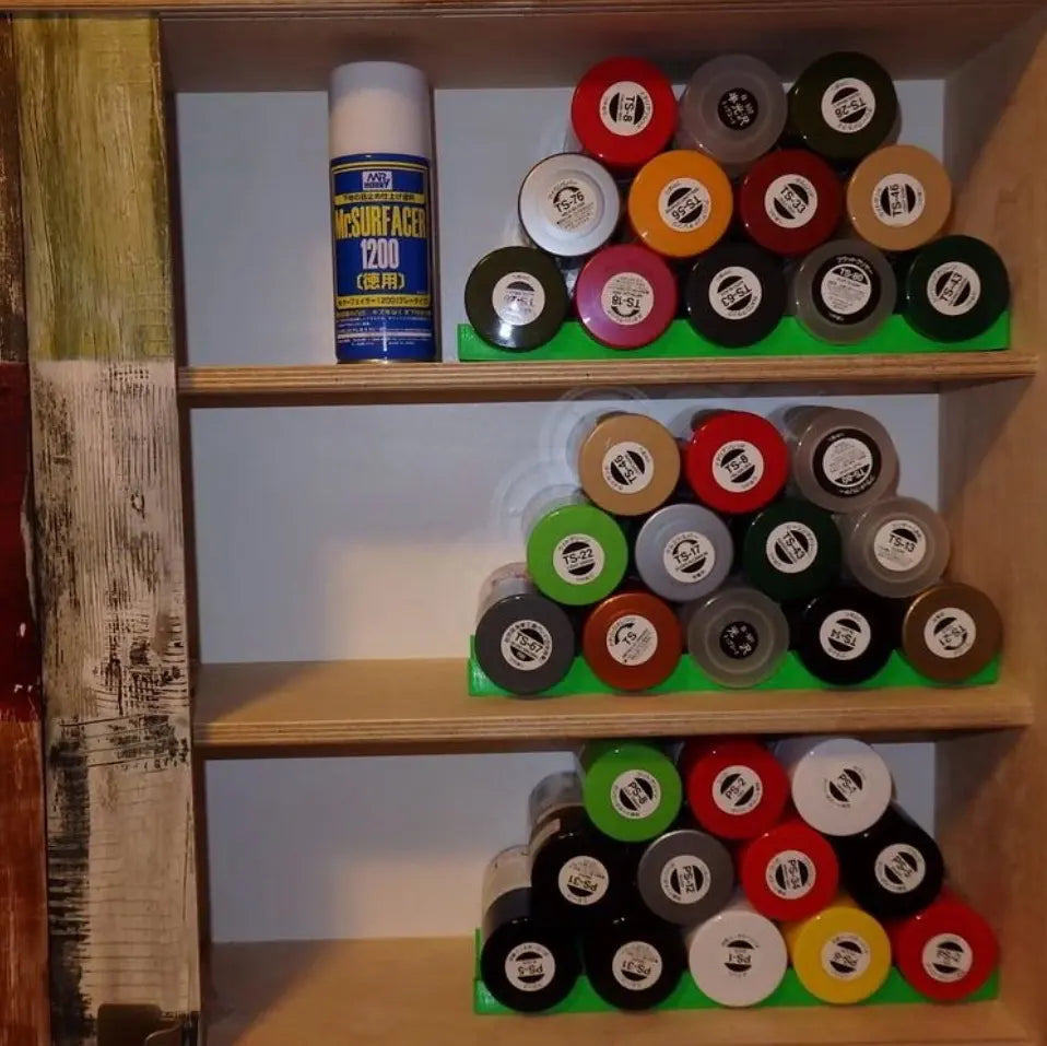 Support pour bombes de peinture aérosol